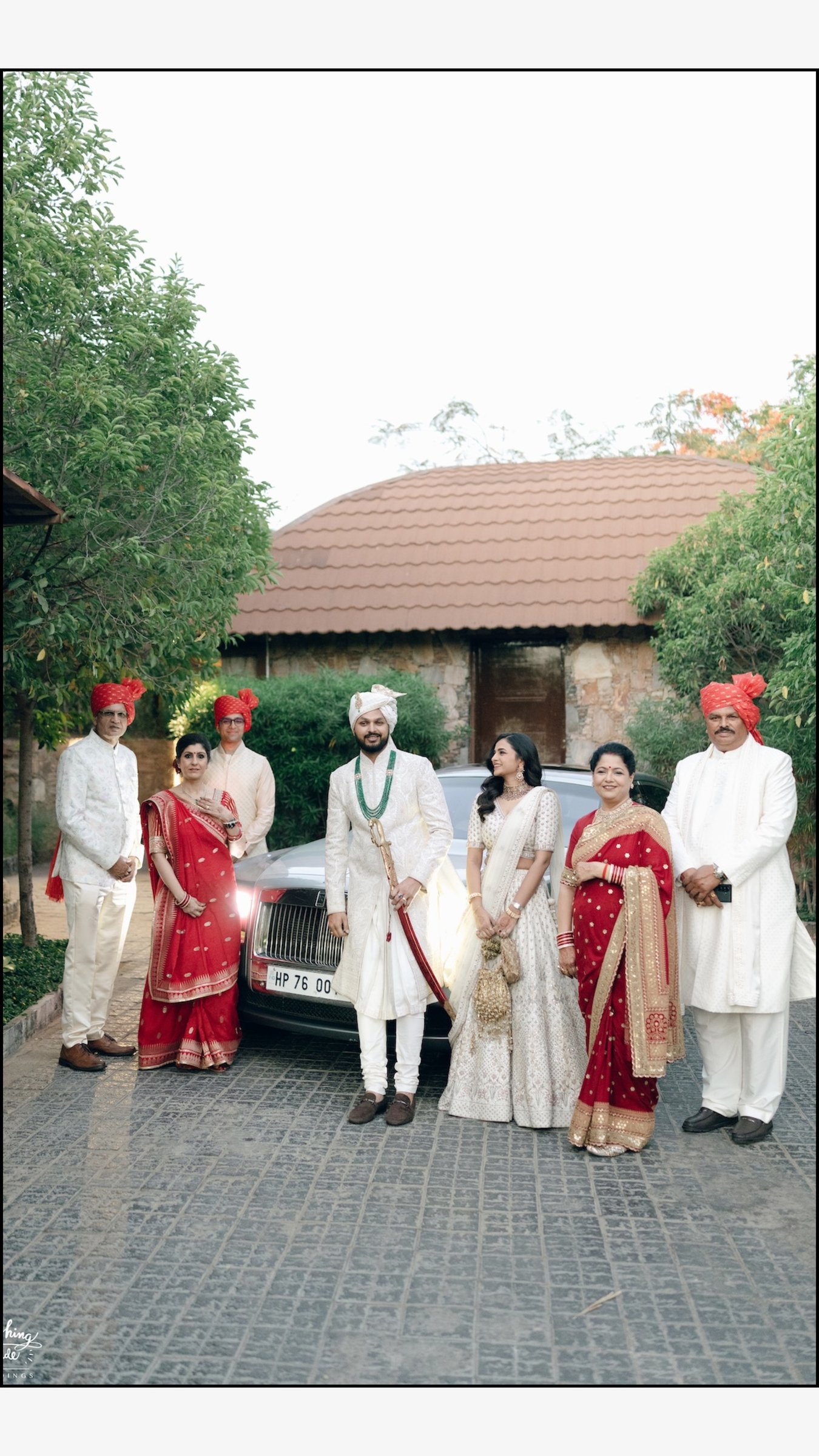 Wedding family group photo in front of the wedding car in Patna